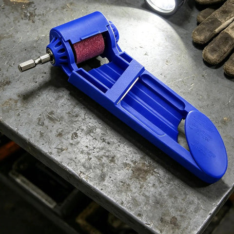 Heavy Duty Angle Grinder And Saw Cutter Featuring Field Ready Drill Bit Sharpening Tool with blue sanding attachment on metal surface.