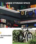 4x6 Ft Resin Outdoor Storage Shed With Reinforced Floor And Lockable Door No Fuss All Weather Plastic Tool Shed With Window And Vents For Garden Patio Bikes Garbage Cans And Yard Gear Dark Gray showing interior storage space with shelves and bicycle accommodation.