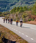 Cyclists on a scenic road using Edge 1050 Premium All In One Cycling Computer Gift Box Bundle With Color Touchscreen