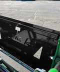 Compact Stump Bucket For Small Tractors That Delivers Max Leverage To Tackle Huge Stumps, green attachment, close-up view