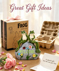 Solar Frog Garden Statue With Realistic Succulent And 7 LED Lights, Outdoor Lawn Decor next to gift box and flowers