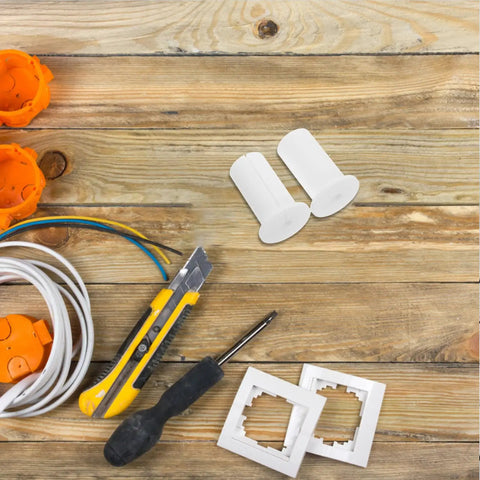 Stylish VILLCASE 4 Pack Silicone Wall Hole Plugs For 1 Inch Grommets white silicone plugs with cables and wall plates on wood surface