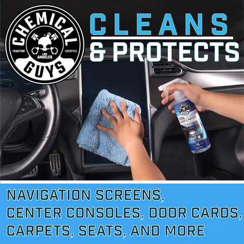 Chemical Guys Total Interior Cleaner & Protectant spray bottle with blue microfiber cloth cleaning a car interior.