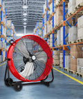 24 Inch Heavy Duty Industrial Drum Fan With 8100 CFM Beast Airflow And 3 Speed Control in warehouse setting