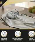 Idea Home microfiber cleaning cloth, large 16x24 inches, gray fabric with black edge; glass goblet resting on it.