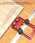 CNC Machined Aluminum Alloy Double Wheel Bearing Roller Features Wide Nonskid Rubber Wheels on table saw with wood.
