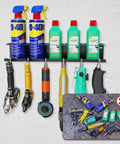Heavy Duty Wall Mounted Pneumatic Tool Rack And Spray Can Organizer Combo Featuring Six Tough Air Tool Slots Plus Five Secure Aerosol Holder Bays with tools and spray cans.