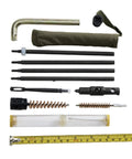 Top Shelf M1 Garand Care Kit Featuring Bronze Wrench And Gas Cylinder Screw With Multi Tool Oiler And Brass Chamber Brushes To Keep Your Iron Runnin Smooth Daily parts arrangement on a white background.