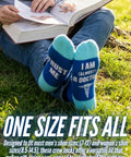 Light Blue And Navy Med School Graduation Crew Socks For Future Docs And Nurses Great White Coat Ceremony Gift Milestone Socks For Medical Students And Residents A Fun Motivational Piece For Finals Week, worn by person reading book outdoors.