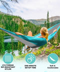 Versatile Camping Hammock For One Or Two Portable And Lightweight Includes Two Tree Straps And Built In Carry Bag Totally Great For Outdoor Indoor Beach And Camping Supports Up To 400 Lbs Easy Setup And Tree Friendly Straps with person lounging against forest backdrop