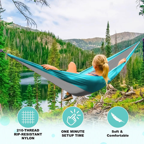 Versatile Camping Hammock For One Or Two Portable And Lightweight Includes Two Tree Straps And Built In Carry Bag Totally Great For Outdoor Indoor Beach And Camping Supports Up To 400 Lbs Easy Setup And Tree Friendly Straps with person lounging against forest backdrop