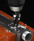 Four Spiral Flute HSS Step Drill Bit Set Metric 4mm To 35mm Unibit For Aluminum Wood Plastic Metal in use on metal surface
