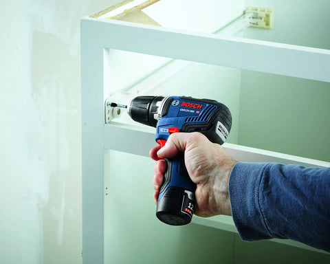 Person using 12V Max EC Brushless 3/8 Inch Drill Driver Bare Tool with Pro Torque 300 In-Lbs, 1,750 RPM in tight cabinet space