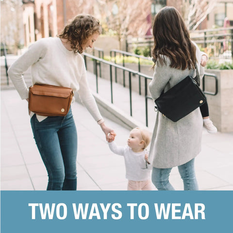 Two women using Crossbody Diaper Bag Tote and Baby Bottle Hip Pack with Adjustable Strap, stroller organizer in a park.