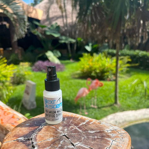 Anti Fog Spray For Swimming Goggles And Diving Masks Defog Solution bottle on a wooden surface in garden setting
