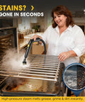 Woman using 2-in-1 Heavy Duty Steam Mop 1500W Power to clean an oven rack with steam, demonstrating its high temp chemical-free cleaning.