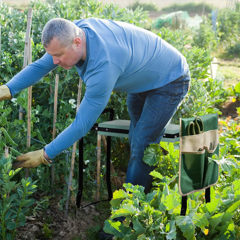 Heavy Duty Garden Kneeler and Seat with Large Four Pocket Tool Bag in use while gardening, showing sturdy frame and tool storage.