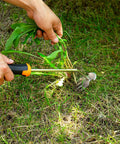 Uproot Like a Pro Hand Held Weeder Puller Tool With Rubber Grip Four Teeth Stainless Steel Weed Remover extracting weed in garden
