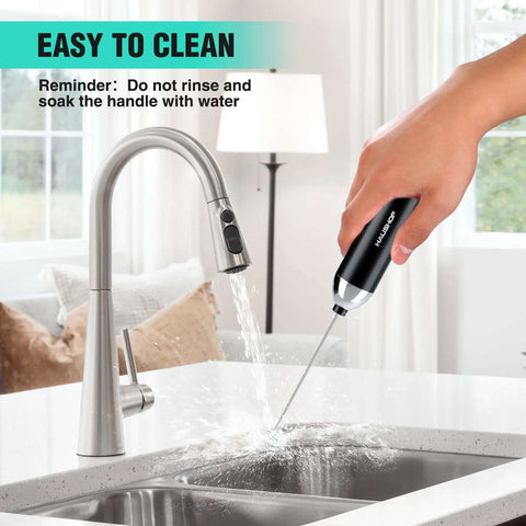 Cleaning Powerful Rechargeable Milk Frother Wand With Stand Handheld Electric Foam Maker for Coffee under faucet.