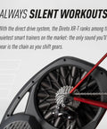 Direto XR-T Direct Drive Bike Trainer with rear cogs and chain, highlighting quiet operation with accurate power readings.