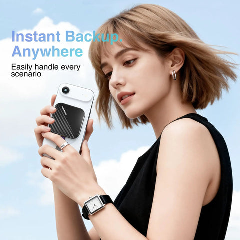Woman using MagSafe Compatible 1TB Magnetic External SSD For iPhone And Mac, Ultra Fast 2000 Megabytes Per Second Transfer, Portable SSD
