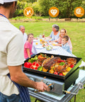Man grilling on tabletop griddle with propane regulator for Blackstone 17 and 22 inch griddles, family dining outdoors.