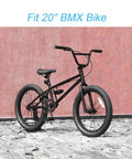 Black BMX bike with 20-inch wheels against pink wall, compatible with Heavy Duty 20 Inch Bike Inner Tubes Kit 2 Pack Fits 20x2.125 To 2.40.