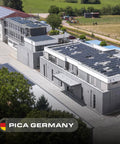 Aerial view of Pica Germany office buildings with solar panels and surrounding greenery.