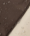 Close-up of Heavy Duty High Back Patio Chair Cover 2 Pack Built To Last Waterproof Outdoor Furniture Covers 600D Oxford PVC material with water droplets.