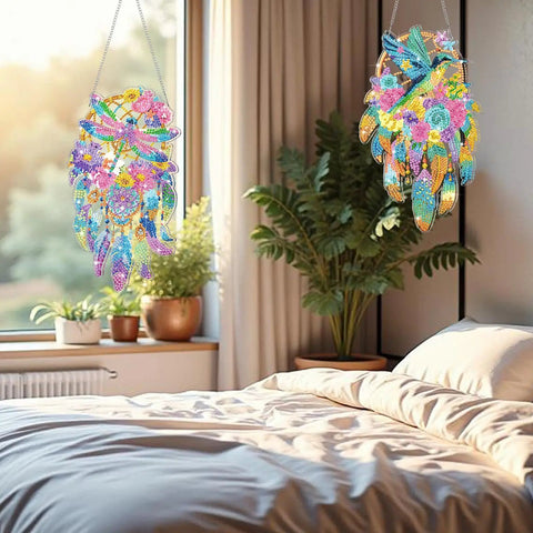Twin Pack Hummingbird Dream Catcher Diamond Painting Kit For Adults with suncatchers hanging in a bedroom window