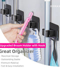 4 Pack Anti Slip Broom Holder Wall Mount Set With Gripper And Hook holding a brush and mop, damage-free with no drill mount.