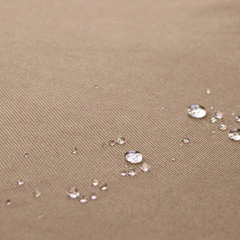 Close-up of waterproof fabric with droplets on 600D polyester used in Waterproof Rectangular Outdoor Coffee Table Cover 48x26x18 Inch