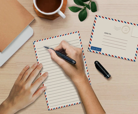 Writing on Vintage Airmail Mini Stationery Set With Fifty Lined Sheets And Fifty Matching Envelopes, Five And A Half By Eight And A Quarter Inches
