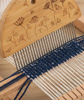 Close-up of weaving comb in use with blue and white yarn, part of Weaving Comb Set for Newbies Three Piece Wood Knitting Loom Tool Kit