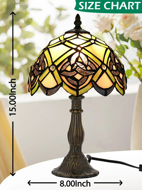 Tiffany Inspired Dope Stained Glass Table Lamp 16 Inch Tall 10 Inch Wide Shade on desk, showing intricate green and yellow design.