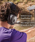 Person wearing Impact Pro Electronic Earmuff With NRR 30 for shooters amplifies ambient noise up to 4x outdoors.