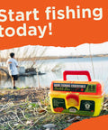 88 Piece Bank Fishing Essentials Tackle Box Kit With Hooks Swivels in a compact blue box beside a lake