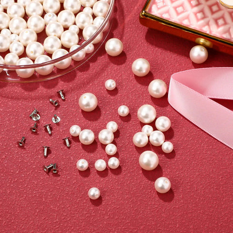 Pearl rivet stud set for clothing and accessories; 150 faux pearls in multiple sizes with metal posts, front view