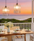 Battery Operated Chandelier With Acrylic Crystal Beads Waterproof Hanging Pendant Lights Dimmable Timer For Patio Decor Two Pack above a dining table.