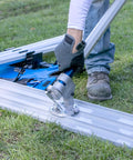 Rock It Bull Float Bracket For Concrete With Easy Half Turn Pitch Control 16 RKT N in use on aluminum track by worker