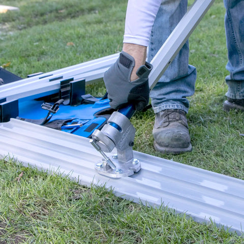 Rock It Bull Float Bracket For Concrete With Easy Half Turn Pitch Control 16 RKT N in use on aluminum track by worker