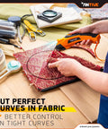 Upgrade To The Latest Antive Electric Scissors For Fabric And Cordless Cardboard Cutter With 2 Heads, Featuring A Safety Lock Button And Tungsten Steel Blades For Smooth, Effortless Cutting. Perfect For Diy Projects. in use, cutting fabric with tight curves.