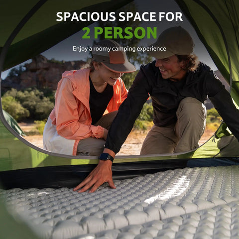 Two people inside Bleik-A 2 To 3 Person Camping Tent With Waterproof Double Layer, spacious interior visible through front opening