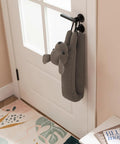 Heavy Duty Door Draft Stopper To Keep The Chill Outta Your Space, 38 inch cotton and sand filled, hanging by door handle.