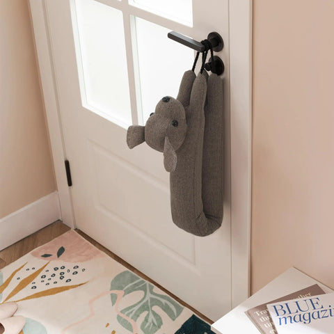 Heavy Duty Door Draft Stopper To Keep The Chill Outta Your Space, 38 inch cotton and sand filled, hanging by door handle.
