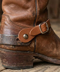 Two Piece Leather Spur Straps For Cowboy Boots on worn brown boot, Adjustable Western Boot Straps For Men And Women, Rustic Flair