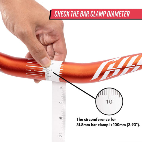 Person measuring 31.8mm clamp diameter on a Full On Mountain Bike Handlebar, 31.8mm Clamp, 785mm Wide, 30mm Rise Beefy Alloy Riser Bar