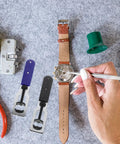 Using Must Have Dual Function Watch Case Opener And Spring Pin Tool Set on leather watch for back cover removal and pin exchange