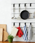 25 Pack Slatwall Hooks Hangers Heavy Duty J Shaped Slatwall Panel Hooks holding kitchen utensils and towels