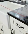 Super Handy 165 Foot Blaze Laser Distance Measure With Backlit Color Display on kitchen counter measuring distance